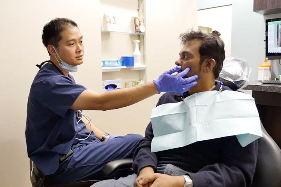 Dr. David Tse and patient
